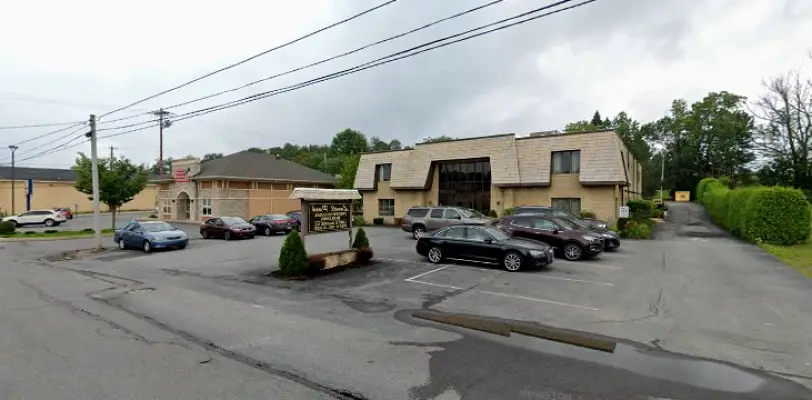 Ebensburg Woo Jr Philip M DDS
