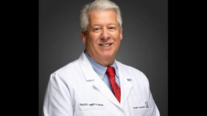  Quincy Daniel Riggs, DDS, MD